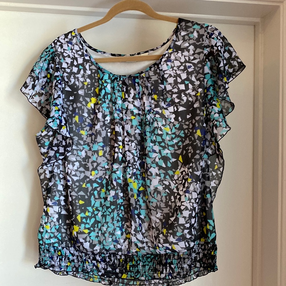 Versona XL flutter sleeve fully lined blouse.